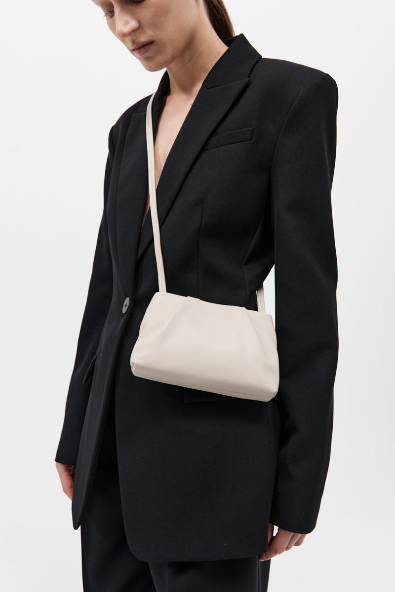 Soft Tuck Sling Pouch - Creme